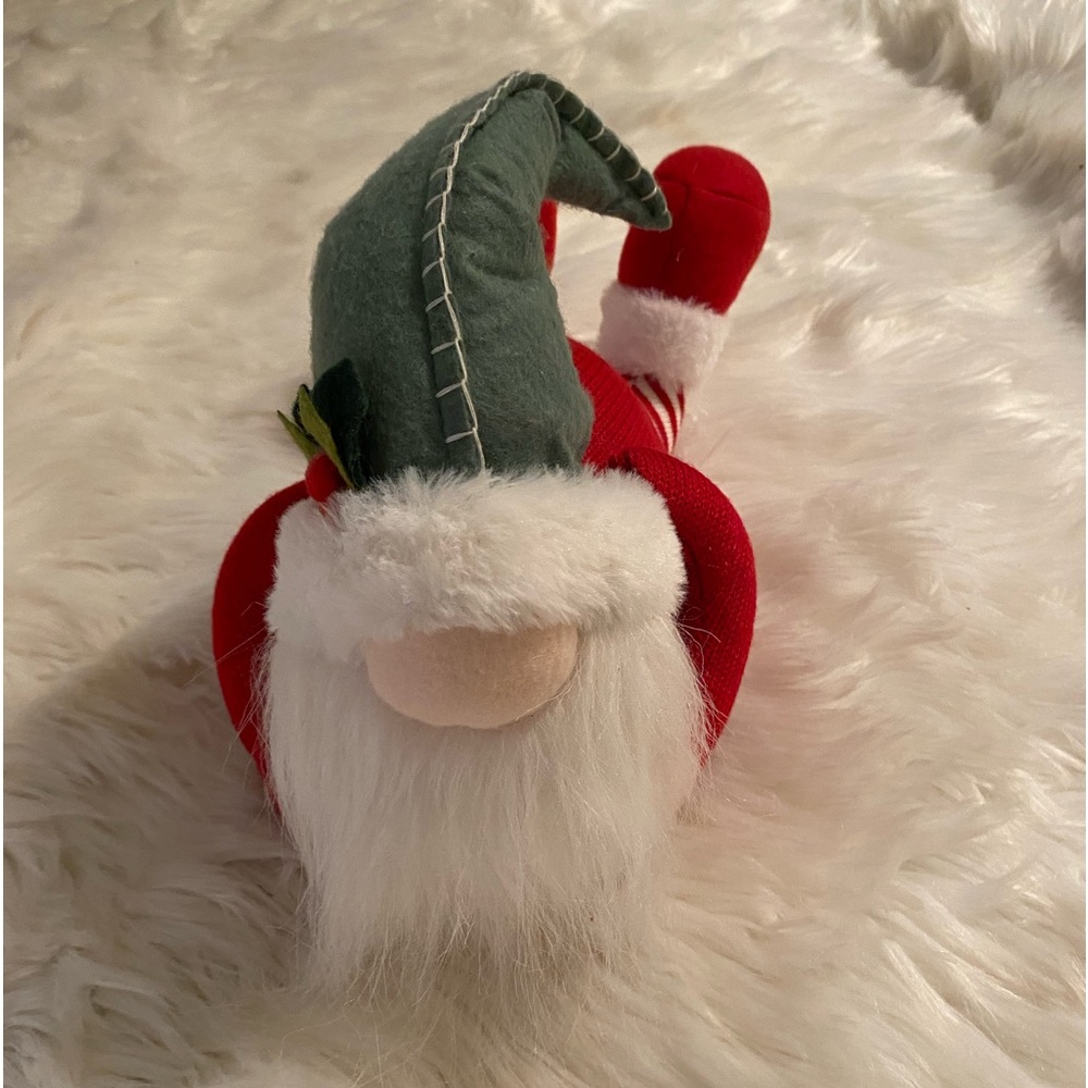 Melrose Christmas Gnome laying down.